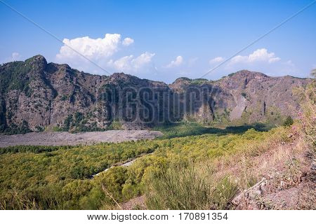 Mount Somma is the remnant of a large volcano out of which the peak cone of Mount Vesuvius has grown.