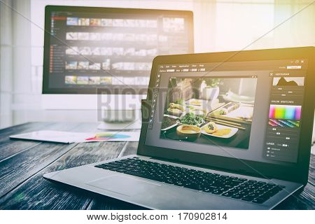 photographer camera editor monitor design laptop photo screen photography - stock image