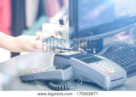 mobile payment phone retail nfc pay paying smart shopping reader woman wireless concept - stock image