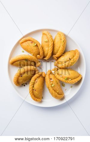 Gujiya - sweet dumplings made during the festival of holi and diwali, selective focus