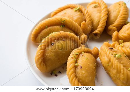Gujiya - sweet dumplings made during the festival of holi and diwali, selective focus