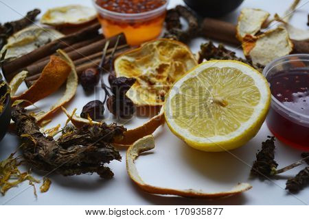 ingredients to prepare aromatic tea made of fruits and herbs