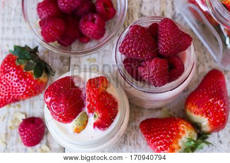 Homemade yogurt with sweet strawberries and raspberries