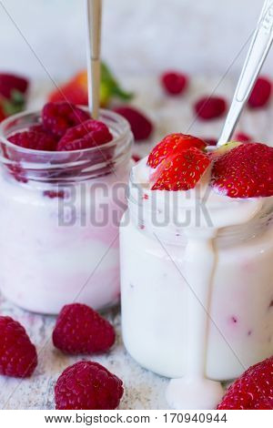 Homemade yogurt with sweet strawberries and raspberries