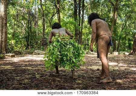 Vedda man holding bow and arrows. Veddas are an indigenous people of Sri Lanka living in tribes in the jungle