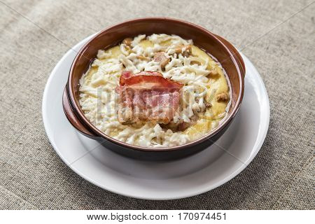 banosh with cheese and bacon. horizontal shot
