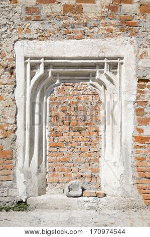 immured brick door. vertical shot. no people