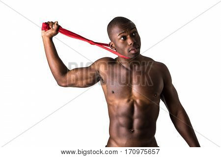 Young shirtless man taking off the red tie or hanging himself, isolated on white.