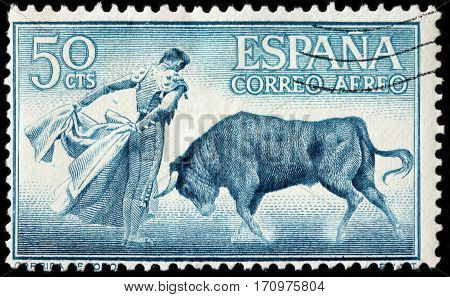 LUGA RUSSIA - FEBRUARY 7 2017: A stamp printed by SPAIN shows beautiful scene of Spanish-style bullfighting circa 1960
