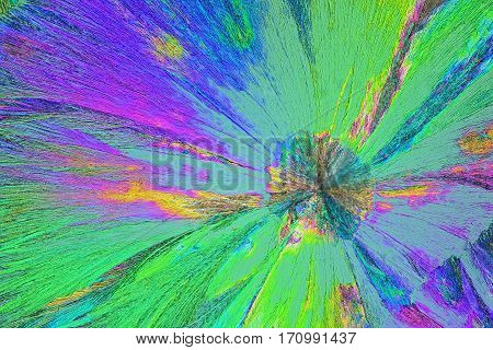 Colorful micro crystals through the microscope in polarized light