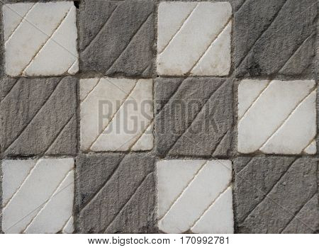 Chequered gray and white stone texture, background image.