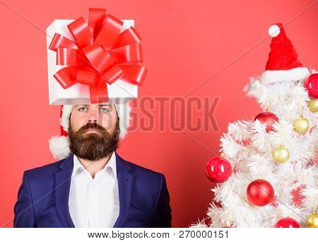 Gift Service. Head Downtrodden With Thoughts What To Gift. Man Bearded Formal Suit Carry Gift Box On