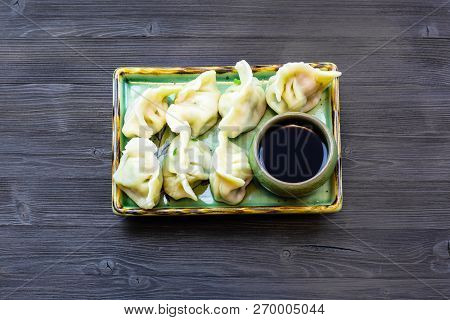 Chinese Cuisine Dish - Top View Of Served Portion Of Dumplings With Three Fillings (shrimp, Egg And 