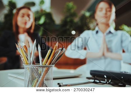 Sport Lifestyle. Healthcare Of Business People. Yoga Practice. Employee Practicing On Chair In Offic
