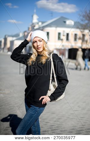 Street Fashion Look. Beautiful Girl In Black Hoody