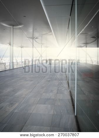 Modern Building Which Reflecting In The Glass Window. Concrete Steel And Glass Materials. Sun Ray On