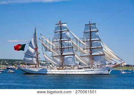 HALIFAX, NOVA SCOTIA, CANADA - AUG 20, 2009: The Sagres sails along the Dartmouth side of Halifax Harbour  during the sail past in the Nova Scotia Tall Ships Festival 2009.
