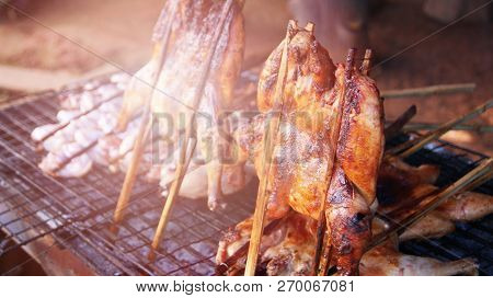 Thai Style Grilled Chicken / Roasting Bbq Chicken With Garnish In Bamboo Stick Thai Style Food Chick