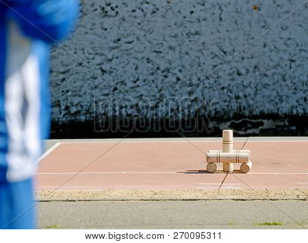 Gorodki - A Russian Folk Sports Game. In This Game You Need Specific Distances To Smash Figures Made