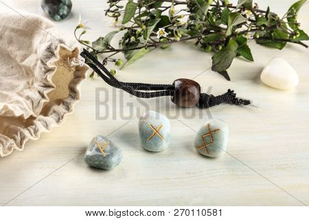A Closeup Photo Of Norse Runes From The Futhark Alphabet, Stones With Symbols Used In Wicca And Othe