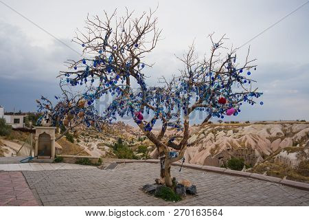 Cappadocia, Turkey. Wish Tree Decorated Turkish Charms Against The Evil Eye.