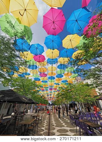 Coral Gables, Florida 08-04-2018 Umbrella Sky in Giralda Plaza, a joint art project by the City of Coral Gables and the Portuguese company Sextafeira.