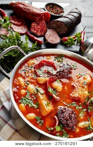 Close-up Of Fabada Asturiana Bean Hearty Stew. Main Ingredients - Sliced Chorizo, Blood Sausages Pep