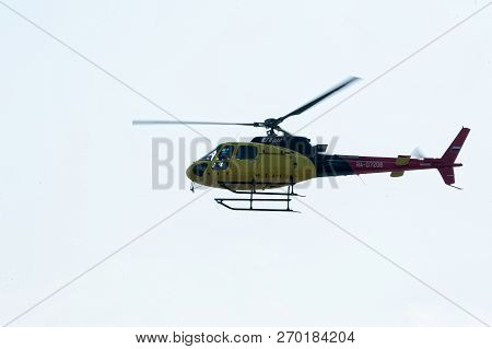 Tyumen, Russia - August 11, 2012: On A Visit At Utair Airshow In Heliport Plehanovo. Pilot Of Robins