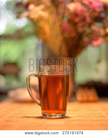 A Cup Of Hot Tea On The Table.