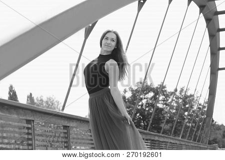 Young Slim Woman With Long Brown Hair Dancing