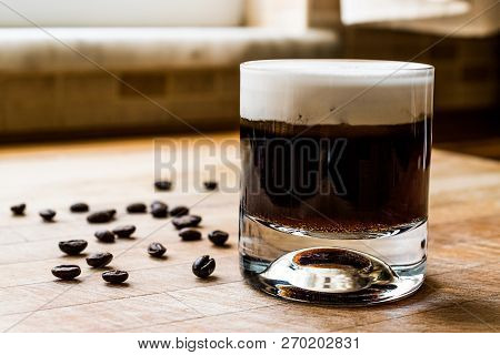 White Russian Cocktail With Coffee Beans.