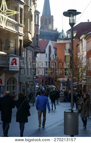 Aschaffenburg, Germany - November 17: Tourists And Pedestrians Walk Through Downtown Aschaffenburg W