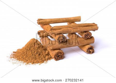 Canella Sticks And Powder Isolated On A White Background. Cinnamon Spices. Stock Images.