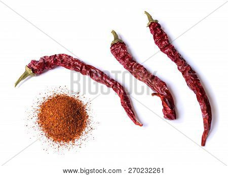 Dried Red Chili Pepper Isolated On White Background. Desiccated Milled Paprika. Top View Flat Lay. S