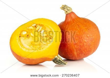 Group Of One Whole One Half Of Fresh Red Kuri Pumpkin Hokkaido Variety With Seeds Isolated On White 