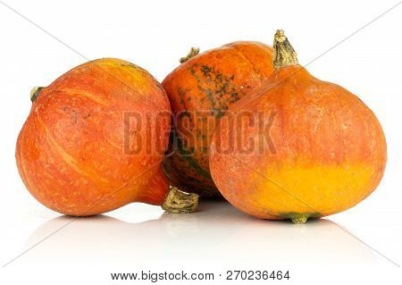 Group Of Three Whole Ripe Fresh Red Kuri Pumpkin Hokkaido Variety Isolated On White Background