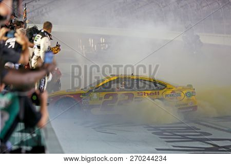 November 18, 2018 - Homestead, Florida, USA: Joey Logano (22) celebrates after winning the Monster Energy NASCAR Cup Series Championship after winning the Ford 400 at Homestead-Miami Speedway 