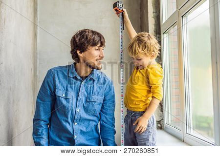 Father And Son Repair Windows Together. Repair The House Yourself