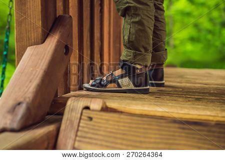 Childrens Orthopedic Shoes On The Boys Feet