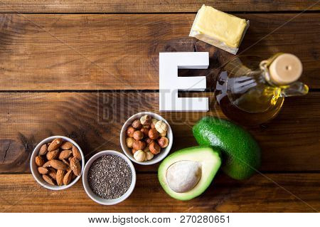 Natural Products Rich In Vitamin E And Letter E. Helthcare Concept