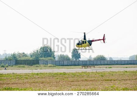 Tyumen, Russia - August 11, 2012: On A Visit At Utair Airshow In Heliport Plehanovo. Pilot Of Robins