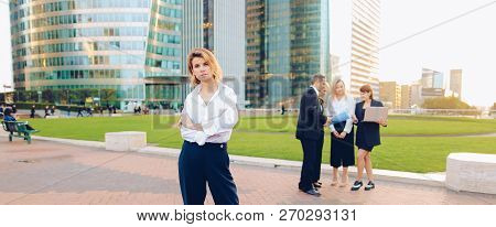 Business Lady With Close Up Face Looking At Camera In   And Empl