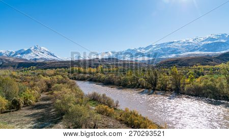 Erzincan, Turkey - October 2018: View Of A Valley With Snow Capped Mountains And River Euphrates Nea