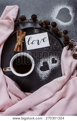 Valentines Day With Cup Of Coffee, Bumps,skarf, Cinnamon And Heart On Gray Table From Above In Flat 