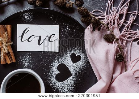 Valentines Day With Cup Of Coffee, Bumps,skarf, Cinnamon And Heart On Gray Table From Above In Flat 