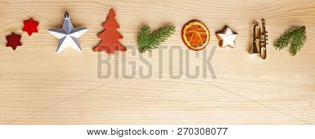Christmas Webbanner, Retro Style Border With Christmas Ornaments And Fir Branches On Bright Wood