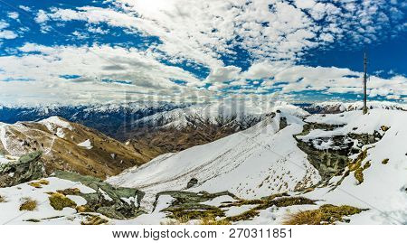 New Zealand mountain panorama and snow ski slopes as seen from Coronet Peak ski resort, Queenstown