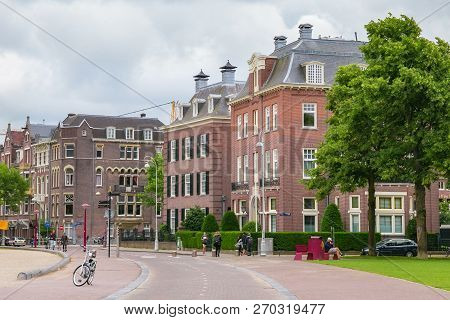 Amsterdam, Netherlands - June 25, 2017: View Of The Buildings From Red Bricks In Center Of Amsterdam