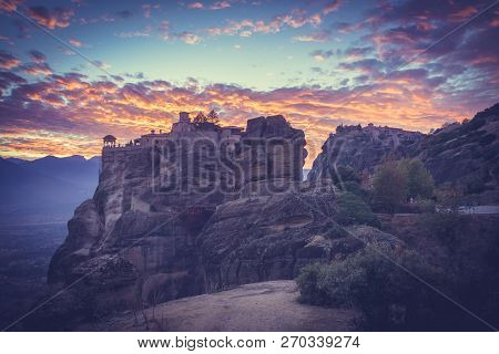 Scenic Sunset Evening Sky Over Holy Varlaam Monastery On Cliff In Meteora, Thessaly Greece. Greek De