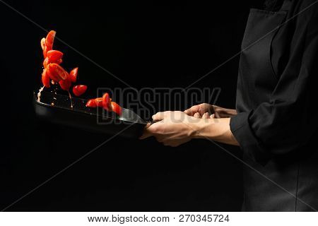 The Chef Prepares Tomato Sauce, Fry The Tomatoes, Cherry Tomatoes In A Frying Pan, Freeze, For Pasta